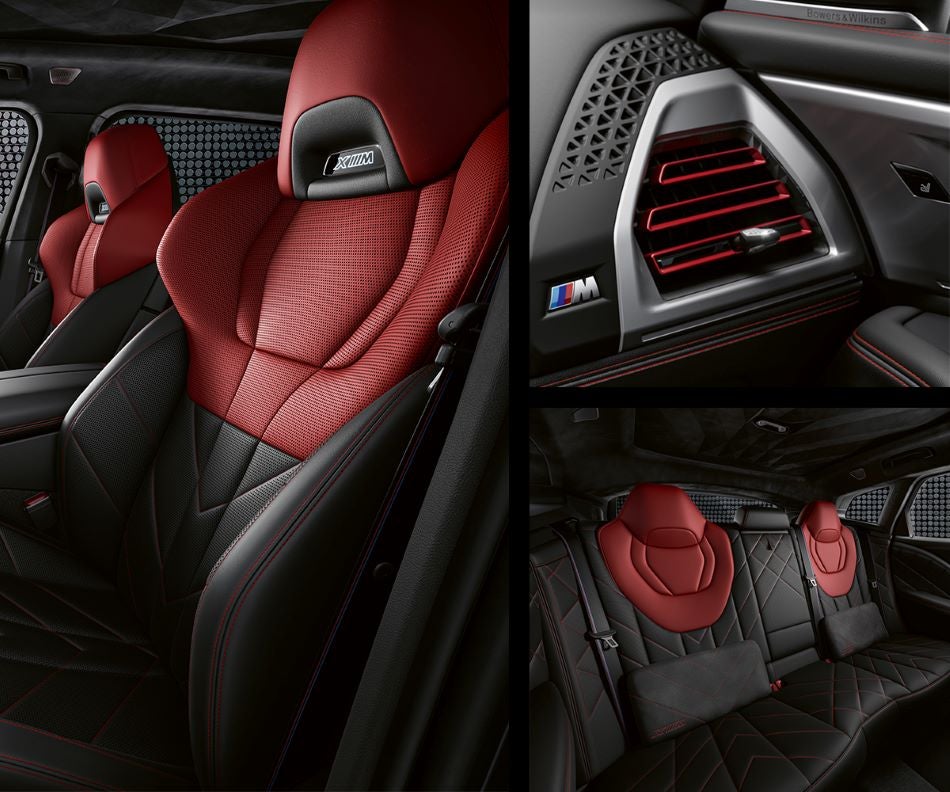 Detail of front seats, clad in exclusive BMW Individual Fiona Red & Black Merino Leather with exclusive M Signature Trim and red stitching and accents. Detail of red accented vent. Detail of rear M Lounge with exclusive XM pillows in BMW of Sterling | Sterling VA
