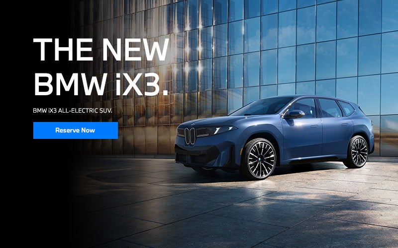 The BMW iX3 SUV parked. Click to learn more.