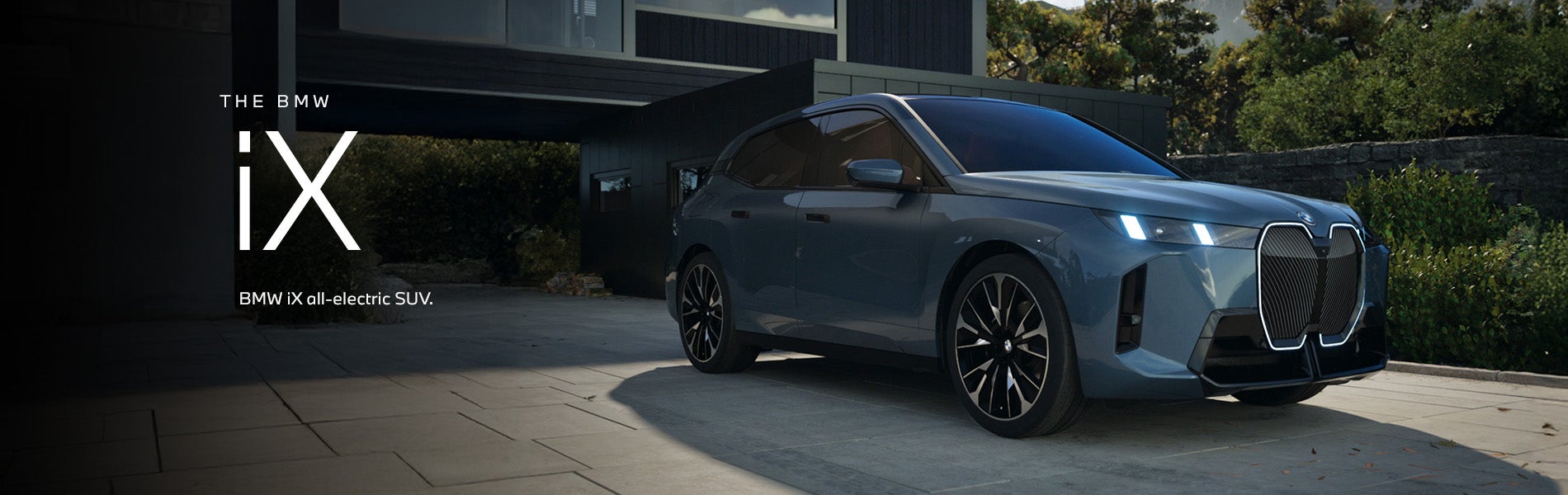 The BMW iX SUV parked. Click to learn more. | BMW of Sterling in Sterling VA