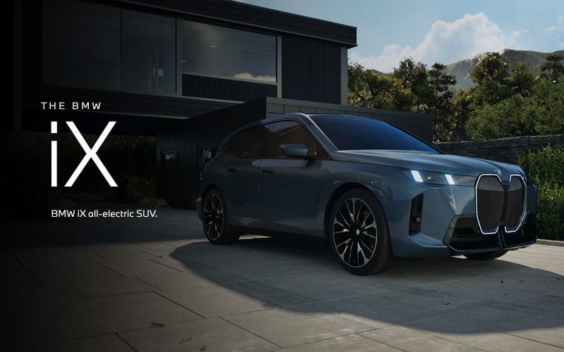 The BMW iX SUV parked. Click to learn more. | BMW of Sterling in Sterling VA