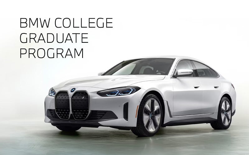 White BMW i4 parked. BMW College Graduate Program. | BMW of Sterling in Sterling VA