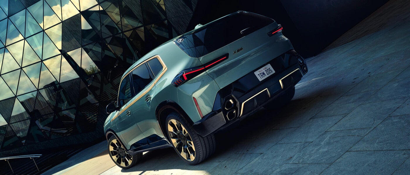 2023 BMW XM in a blue color rear 3/4 view